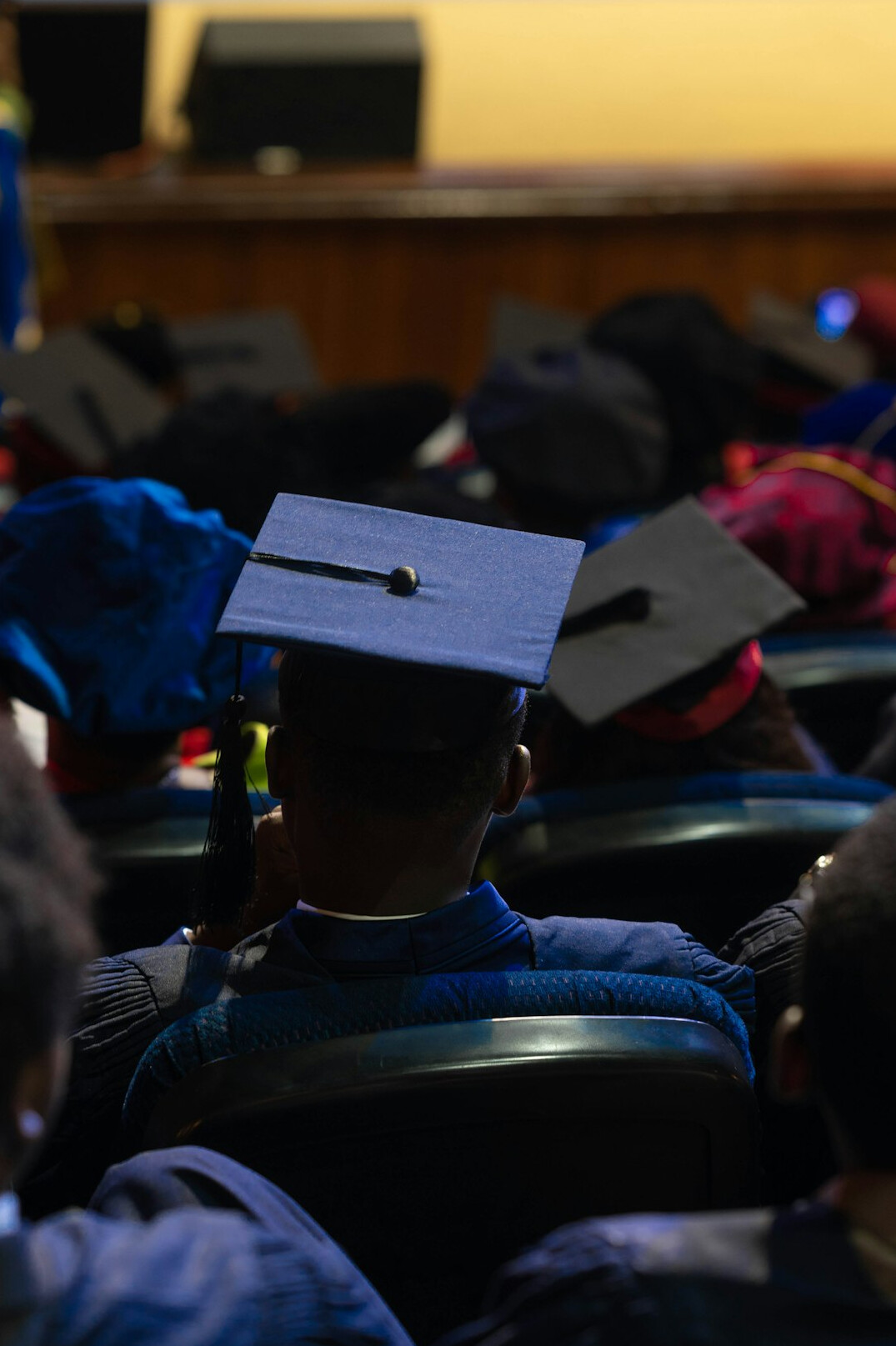 graduation cap on laptop