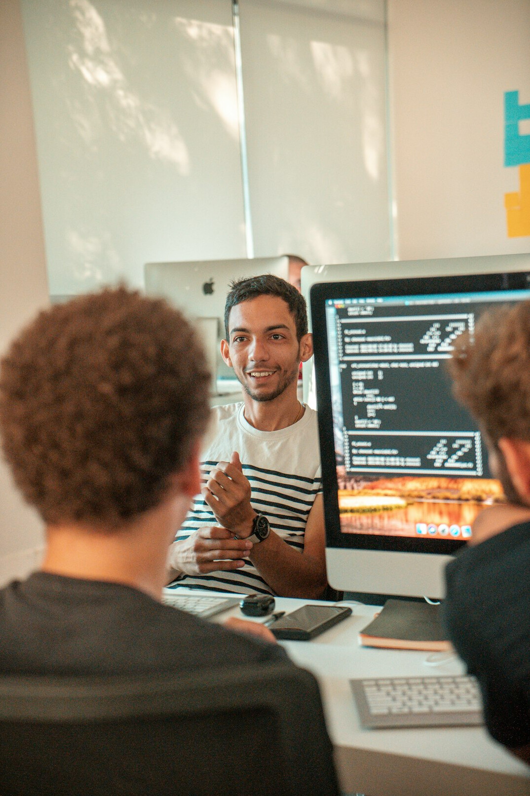 mentor helping student with code